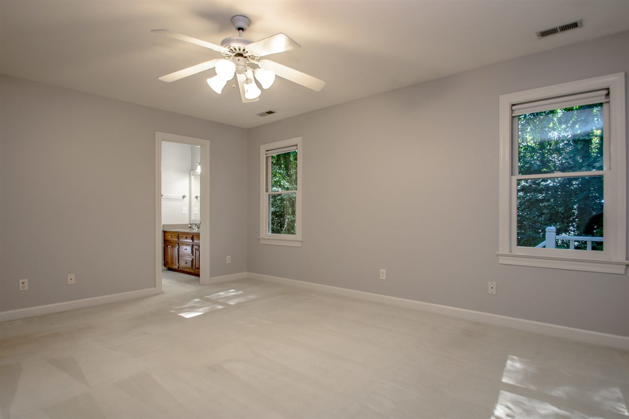 4609 Gramercy Court Raleigh, NC 27609 - Photo 12 of 22 The master bedroom is large and spacious and looks out over the private back yard. Master Bedroom
