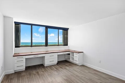 a room with window and a wooden floor