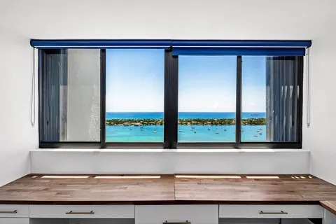 a view of a living room and a window