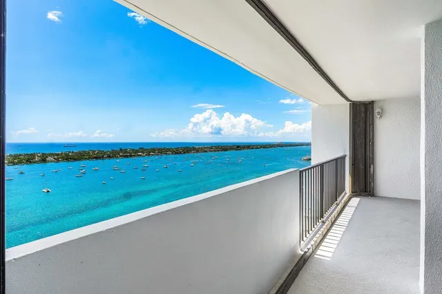 a view of a balcony with lake view
