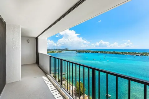 a balcony with an ocean view
