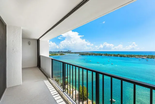 a balcony with an ocean view