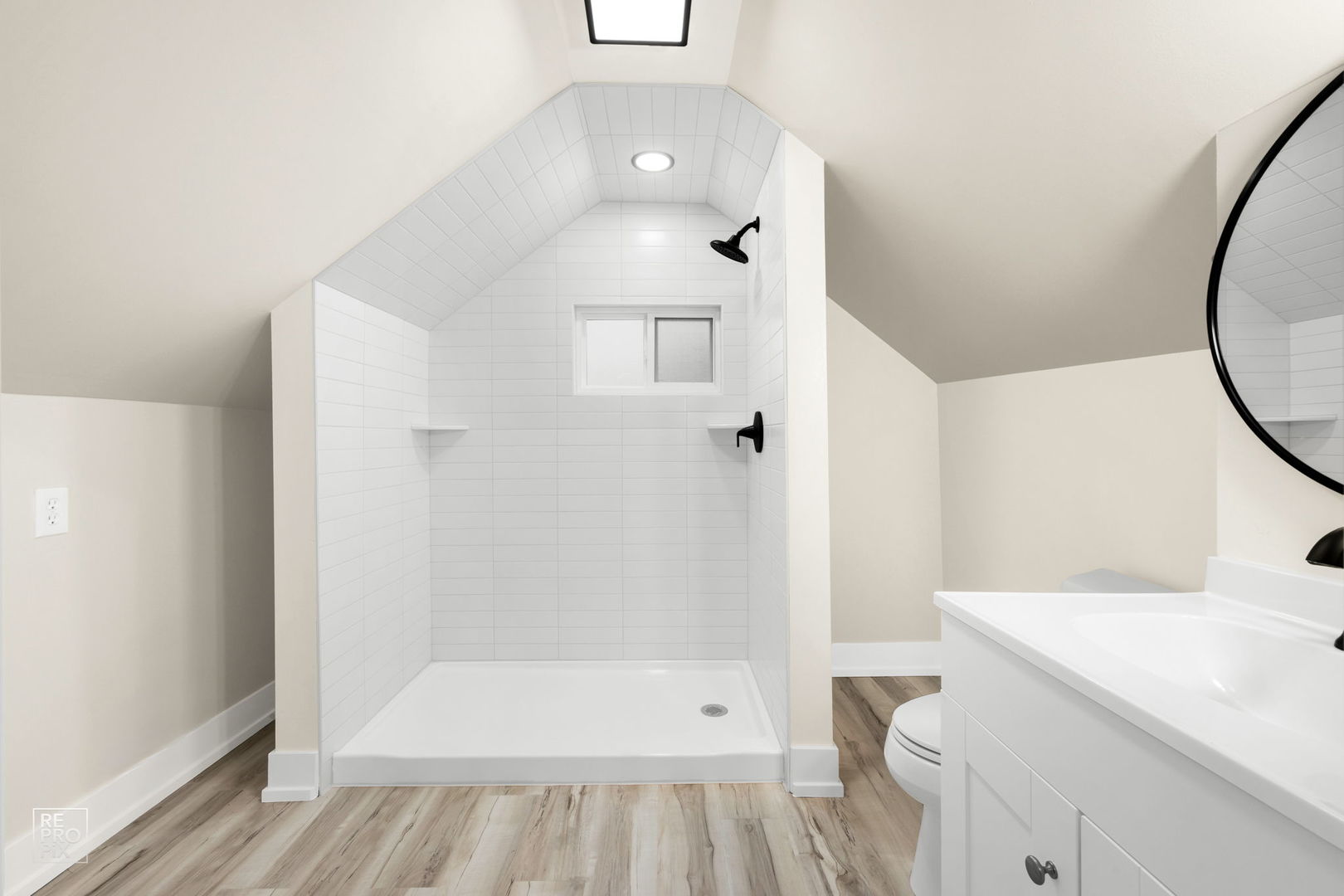 5147 Long Avenue Chicago, IL 60638 - Photo 15 of 17 a bathroom with a sink a toilet and shower