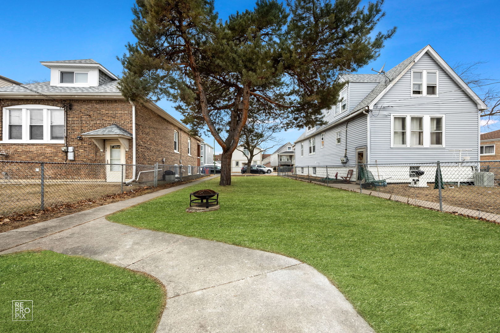 5147 Long Avenue Chicago, IL 60638 - Photo 17 of 17 a view of white house with a yard