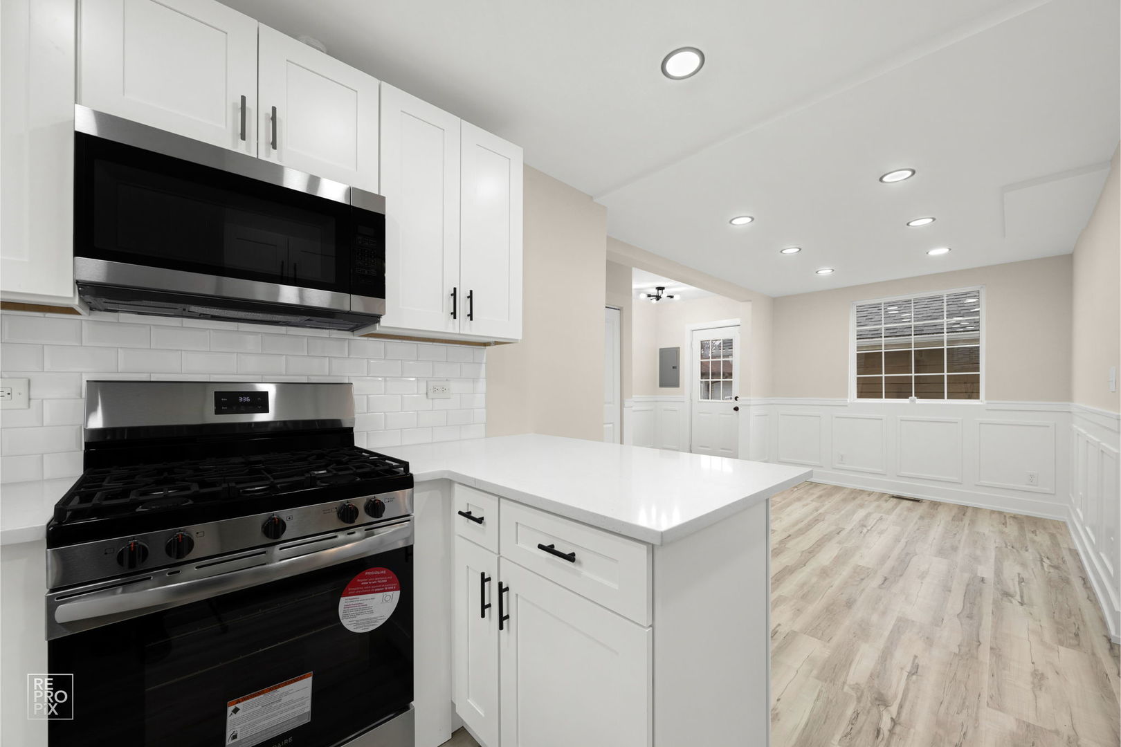 5147 Long Avenue Chicago, IL 60638 - Photo 6 of 17 a kitchen with a sink and steel appliances