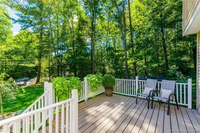 a view of deck with wooden floor and outdoor seating