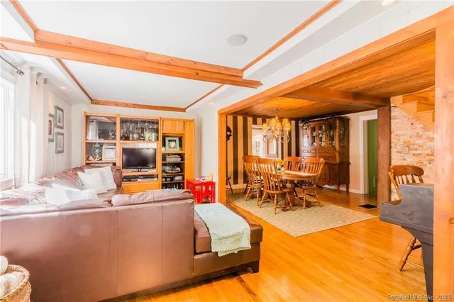 a bed room with a bed and glass windows