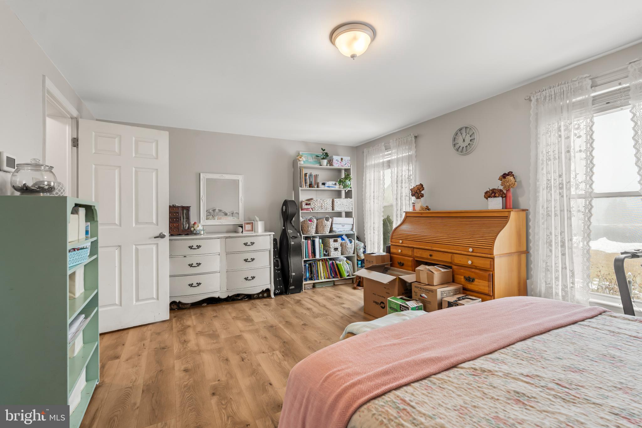 94 Tulip Court Falling Waters, WV 25419 - Photo 17 of 32 a bedroom with a bed and furniture