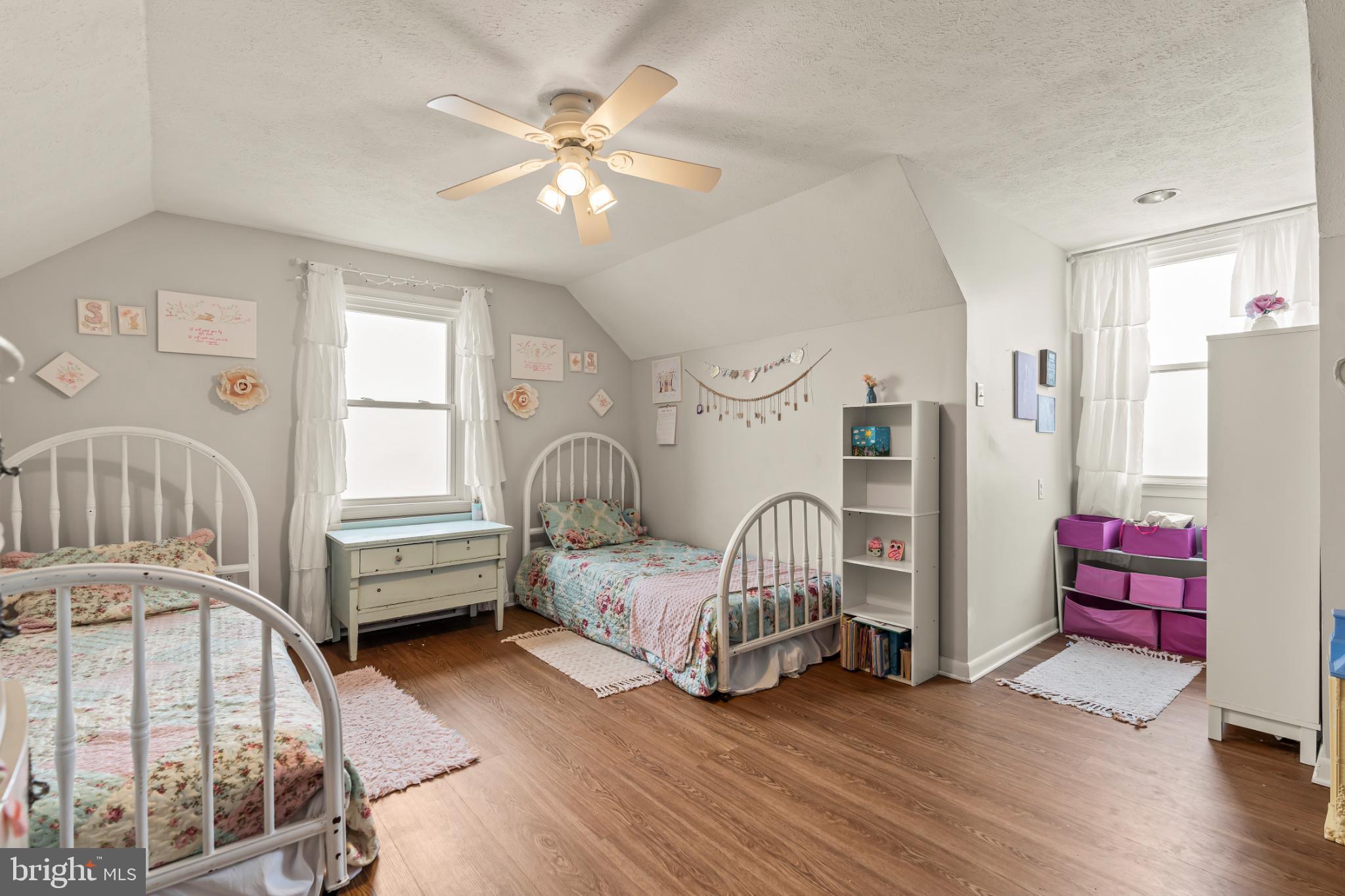 94 Tulip Court Falling Waters, WV 25419 - Photo 24 of 32 a living room with furniture and wooden floor