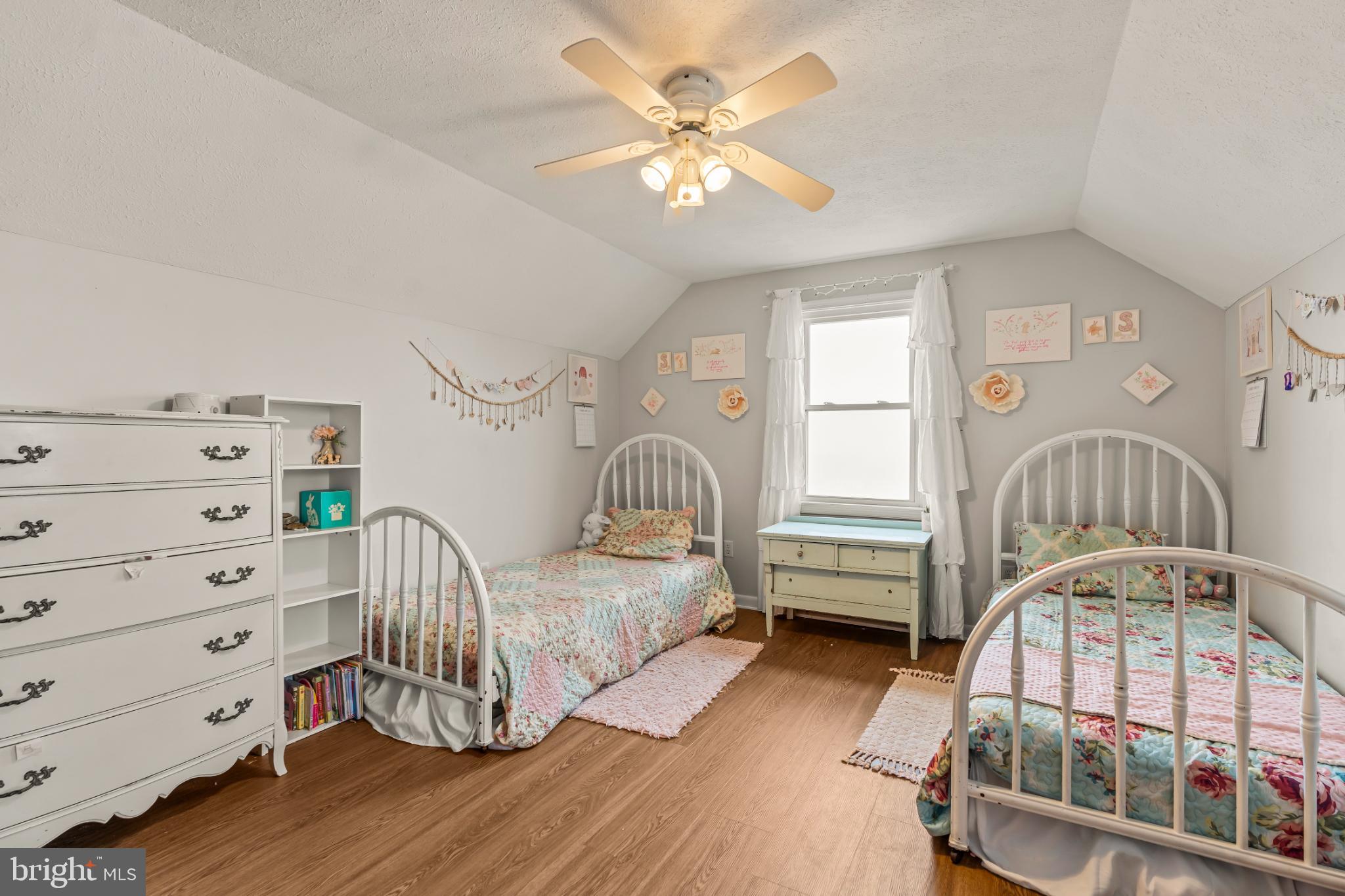 94 Tulip Court Falling Waters, WV 25419 - Photo 26 of 32 a bedroom with furniture and a window