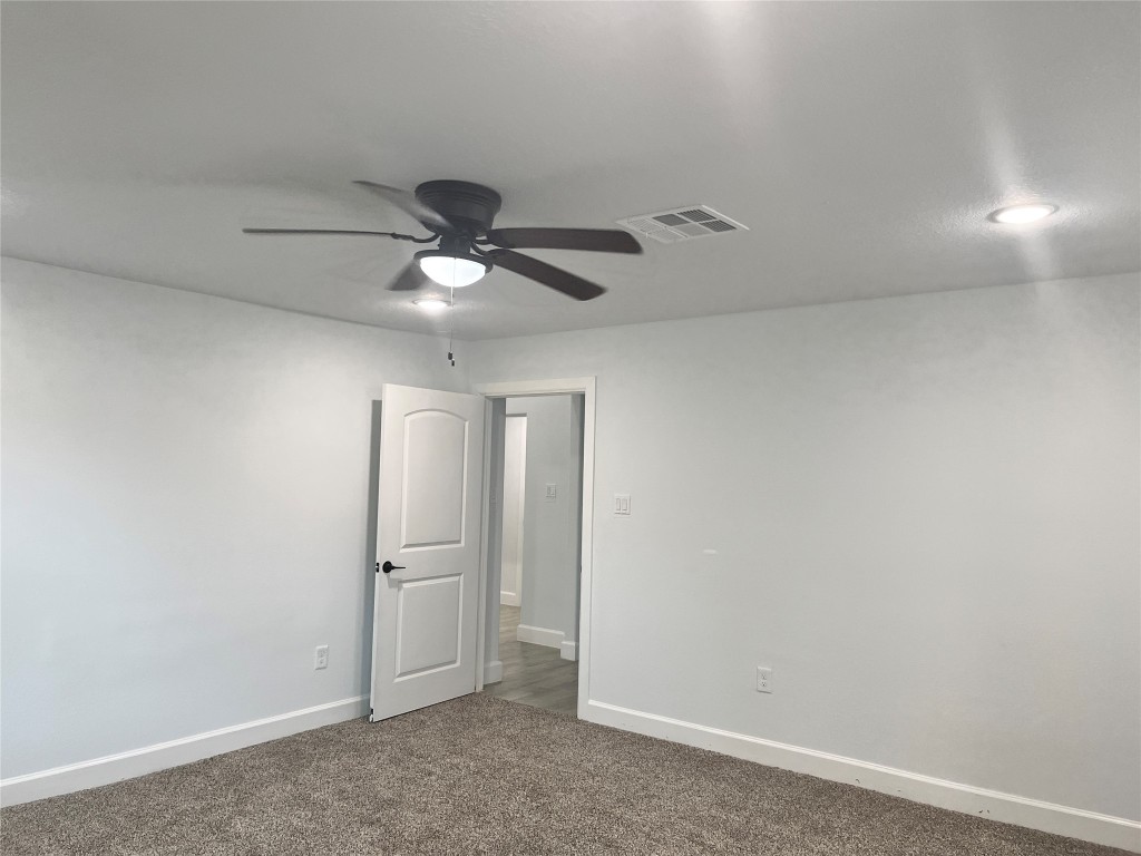 482 Rolling Livingston, TX 77351 - Photo 16 of 41 an empty room with closet and a ceiling fan