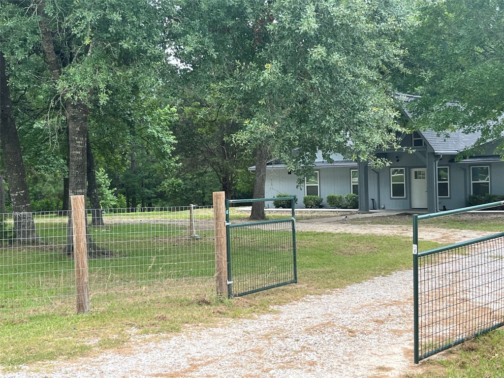 482 Rolling Livingston, TX 77351 - Photo 2 of 41 a view of a house with backyard