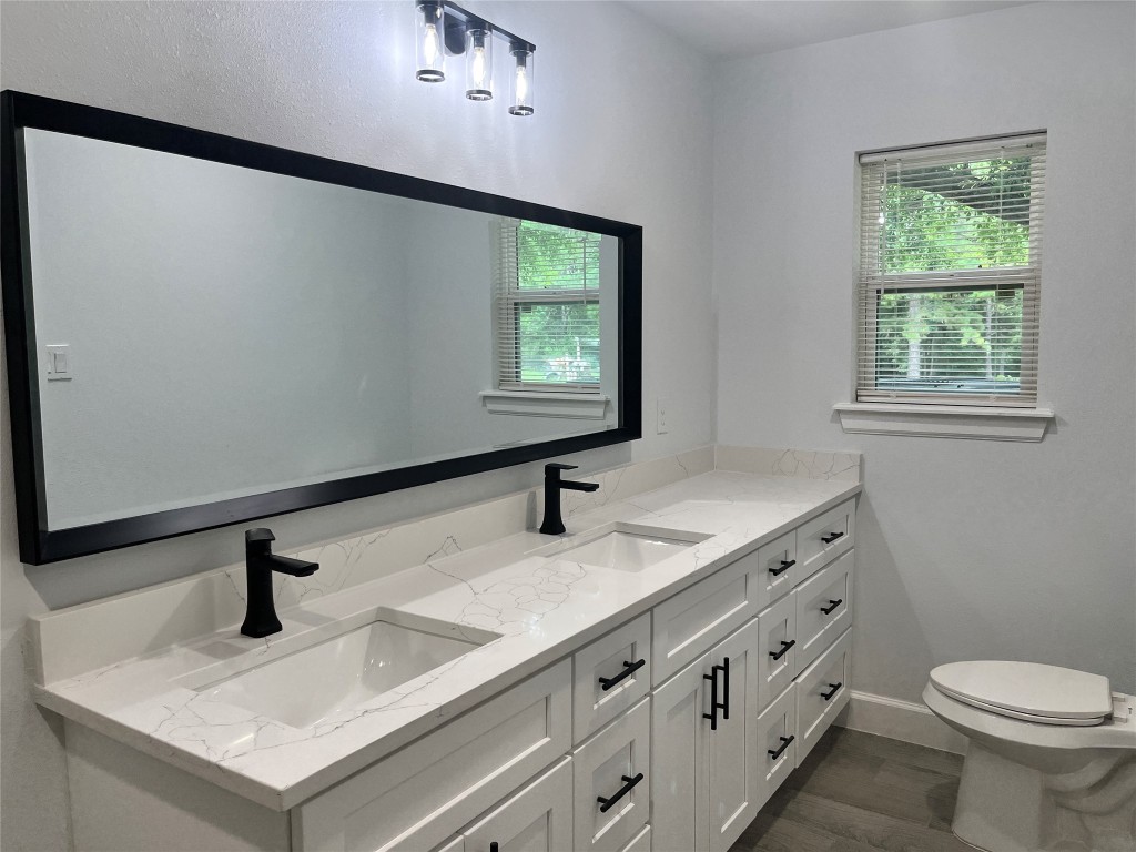 482 Rolling Livingston, TX 77351 - Photo 24 of 41 a bathroom with a sink and a mirror