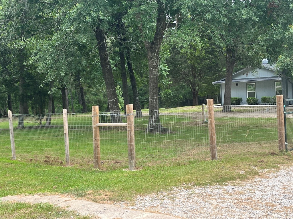 482 Rolling Livingston, TX 77351 - Photo 4 of 41 a view of a house with backyard