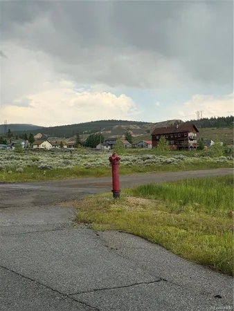 a view of a lake with a big yard