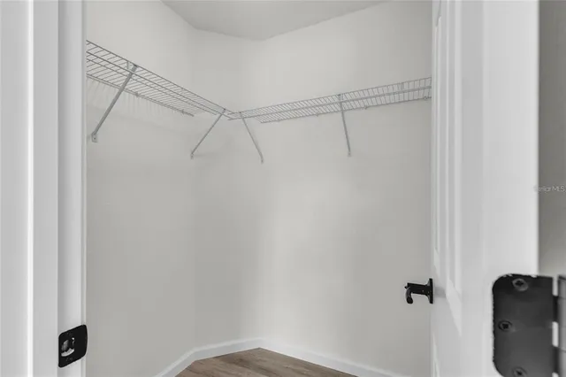 a view of a room with racks on the wall