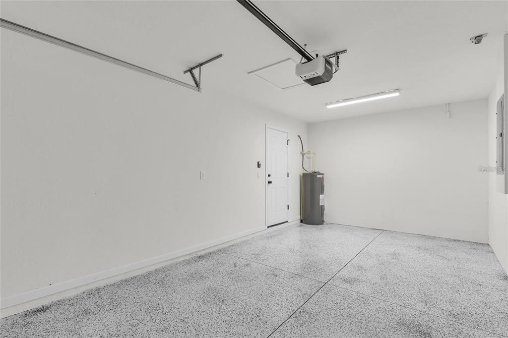 3401 Northeast 16th Court Ocala, FL 34479 - Photo 24 of 27 a view of a livingroom with a ceiling fan and window