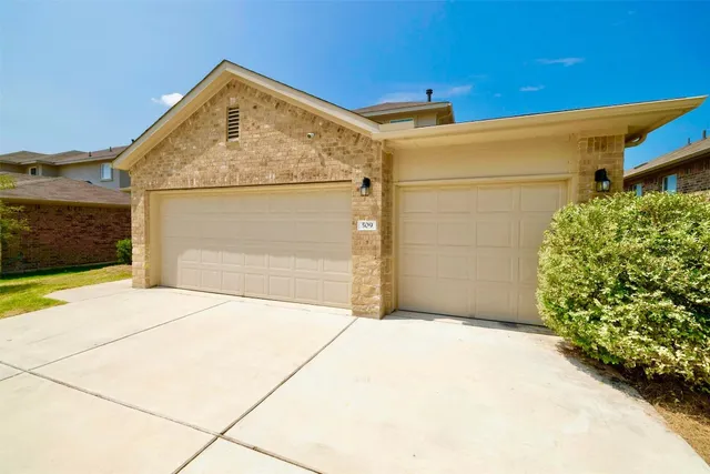 a view of backyard of garage