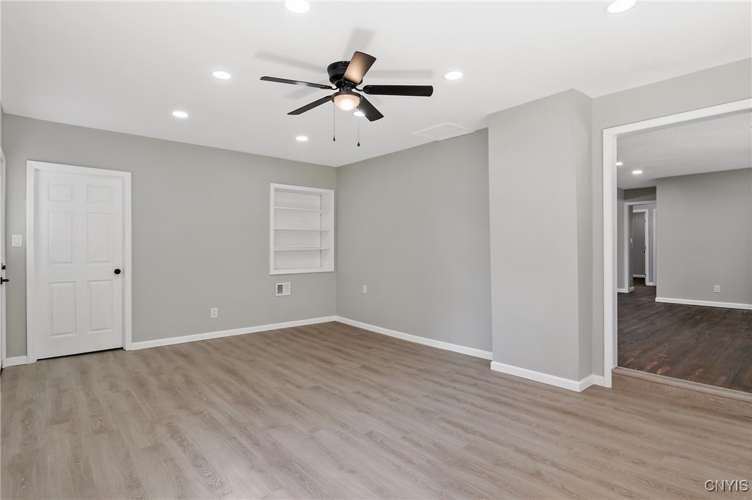 111 Dutch Road West Monroe, NY 13036 - Photo 12 of 30 Into the family room, fresh new laminate flooring