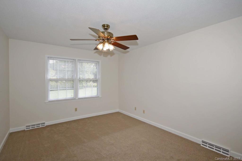 2 Old Farm Road Salisbury, NC 28147 - Photo 13 of 24 an empty room with a window and a fan