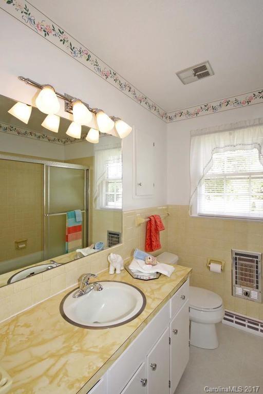 2 Old Farm Road Salisbury, NC 28147 - Photo 16 of 24 a bathroom with a granite countertop sink mirror and a toilet