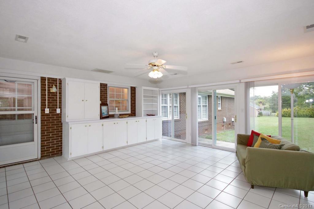 2 Old Farm Road Salisbury, NC 28147 - Photo 20 of 24 a living room with furniture and a flat screen tv