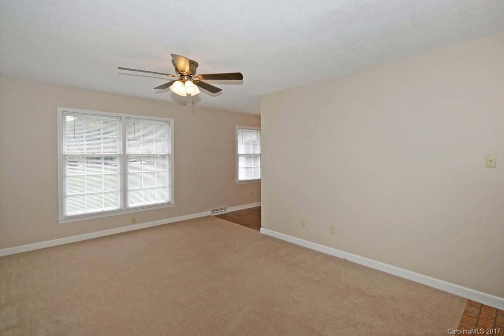2 Old Farm Road Salisbury, NC 28147 - Photo 4 of 24 an empty room with windows and fan