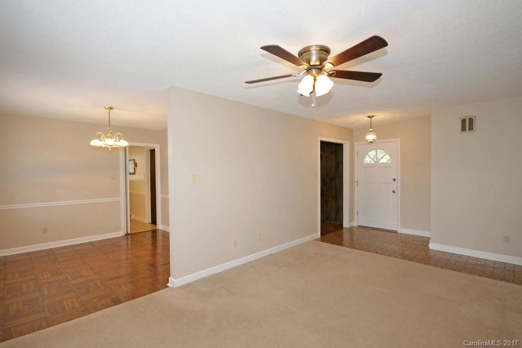 2 Old Farm Road Salisbury, NC 28147 - Photo 6 of 24 a view of a livingroom with a ceiling fan and window