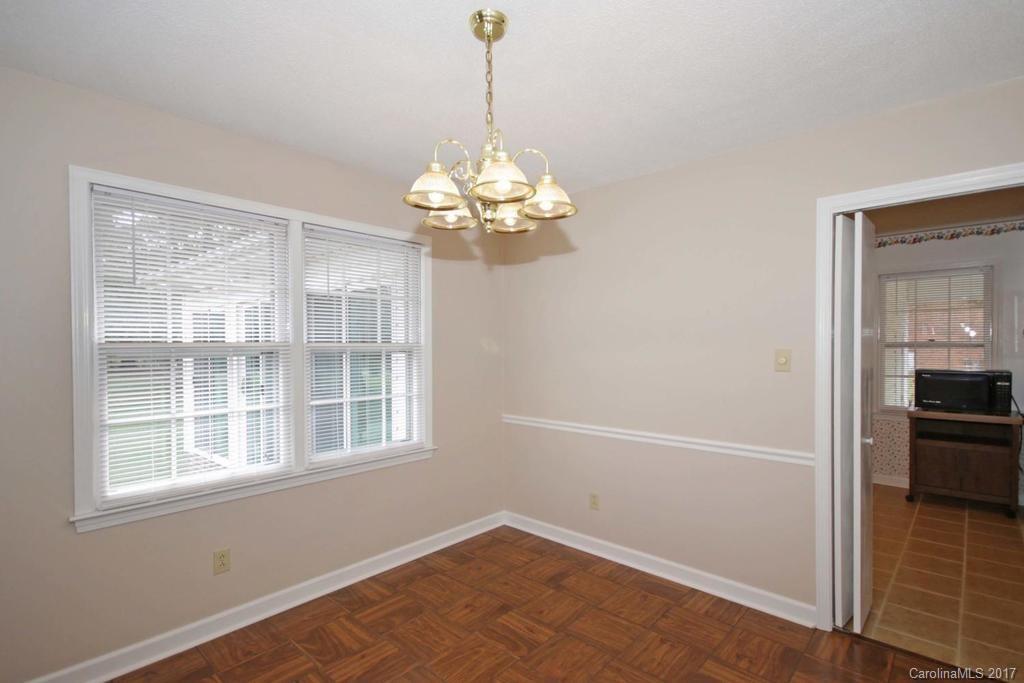 2 Old Farm Road Salisbury, NC 28147 - Photo 7 of 24 wooden floor in an empty room with a window
