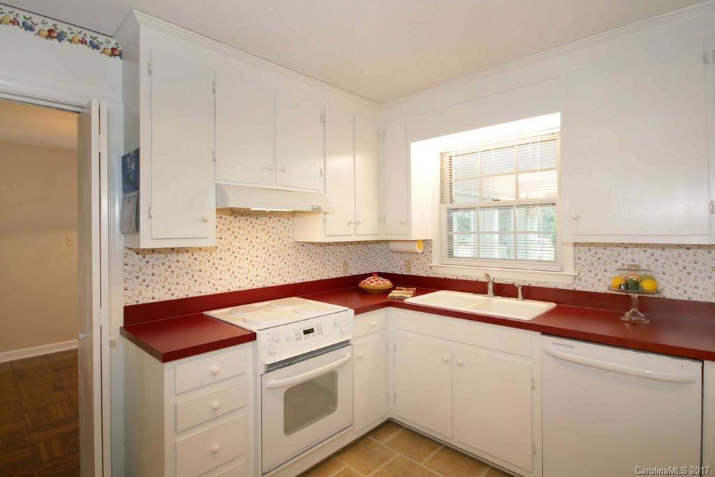 2 Old Farm Road Salisbury, NC 28147 - Photo 9 of 24 a kitchen with a sink stove and cabinets