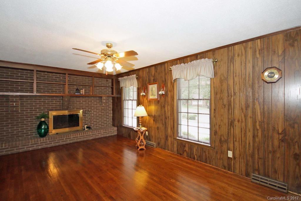 2 Old Farm Road Salisbury, NC 28147 - Photo 10 of 24 a view of an empty room with a fireplace and a window