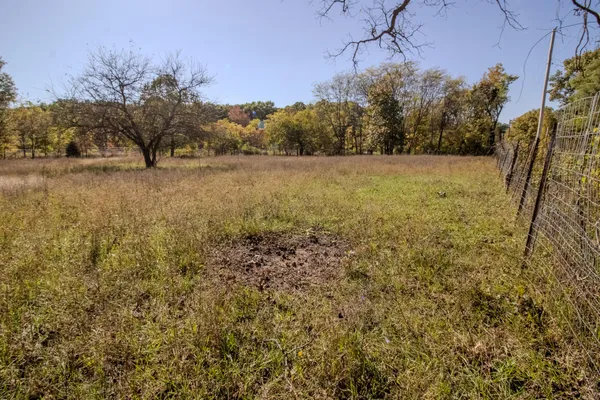 a view of lake with green space