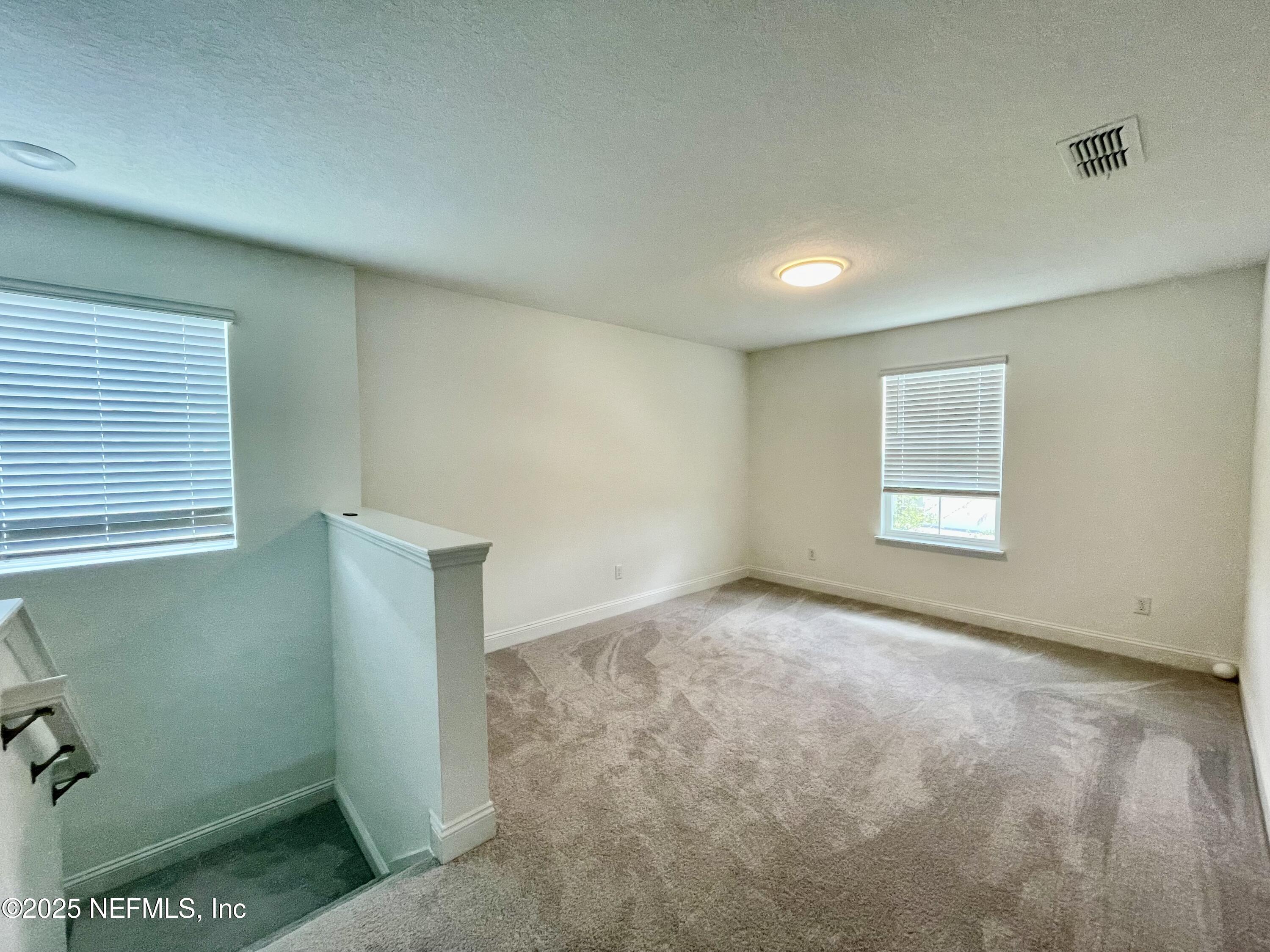 134 Varner Way St. Augustine, FL 32092 - Photo 11 of 30 a view of an empty room with a window