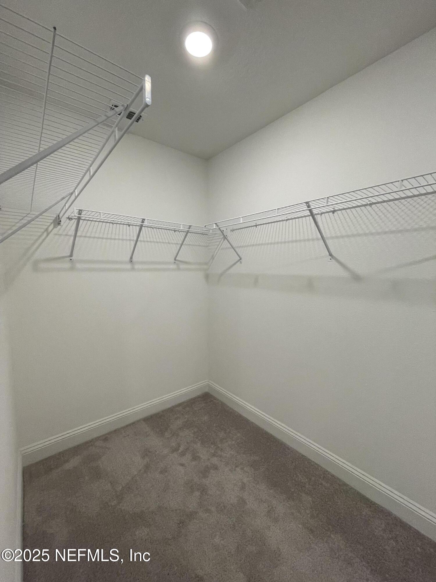 134 Varner Way St. Augustine, FL 32092 - Photo 17 of 30 a view of a room with racks on the wall