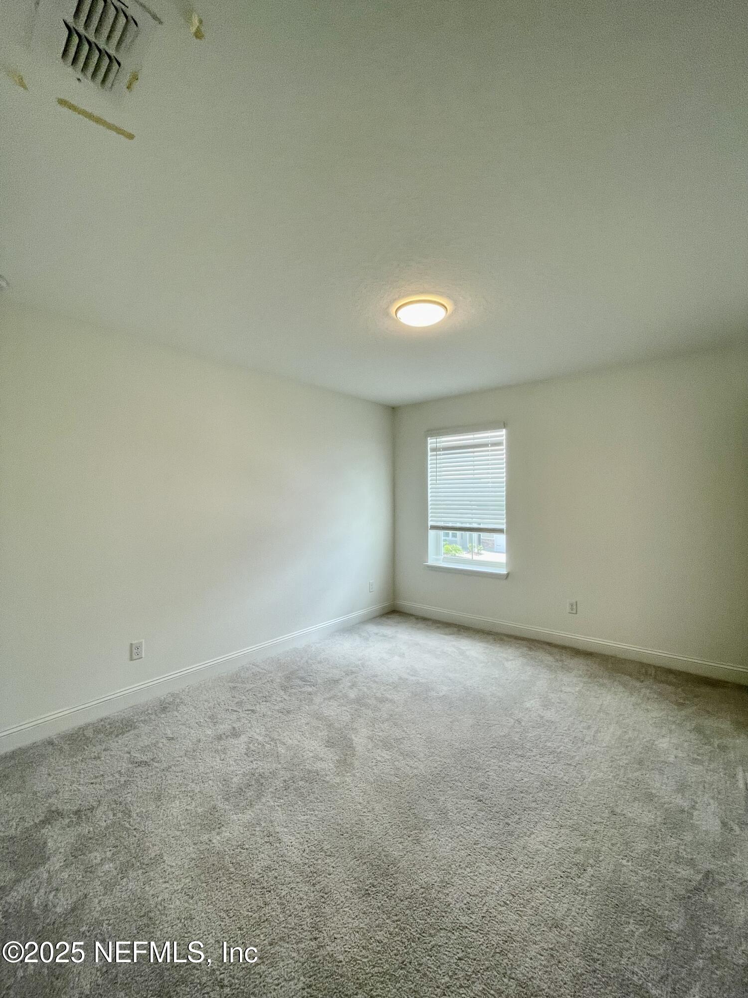 134 Varner Way St. Augustine, FL 32092 - Photo 20 of 30 an empty room with a workbench