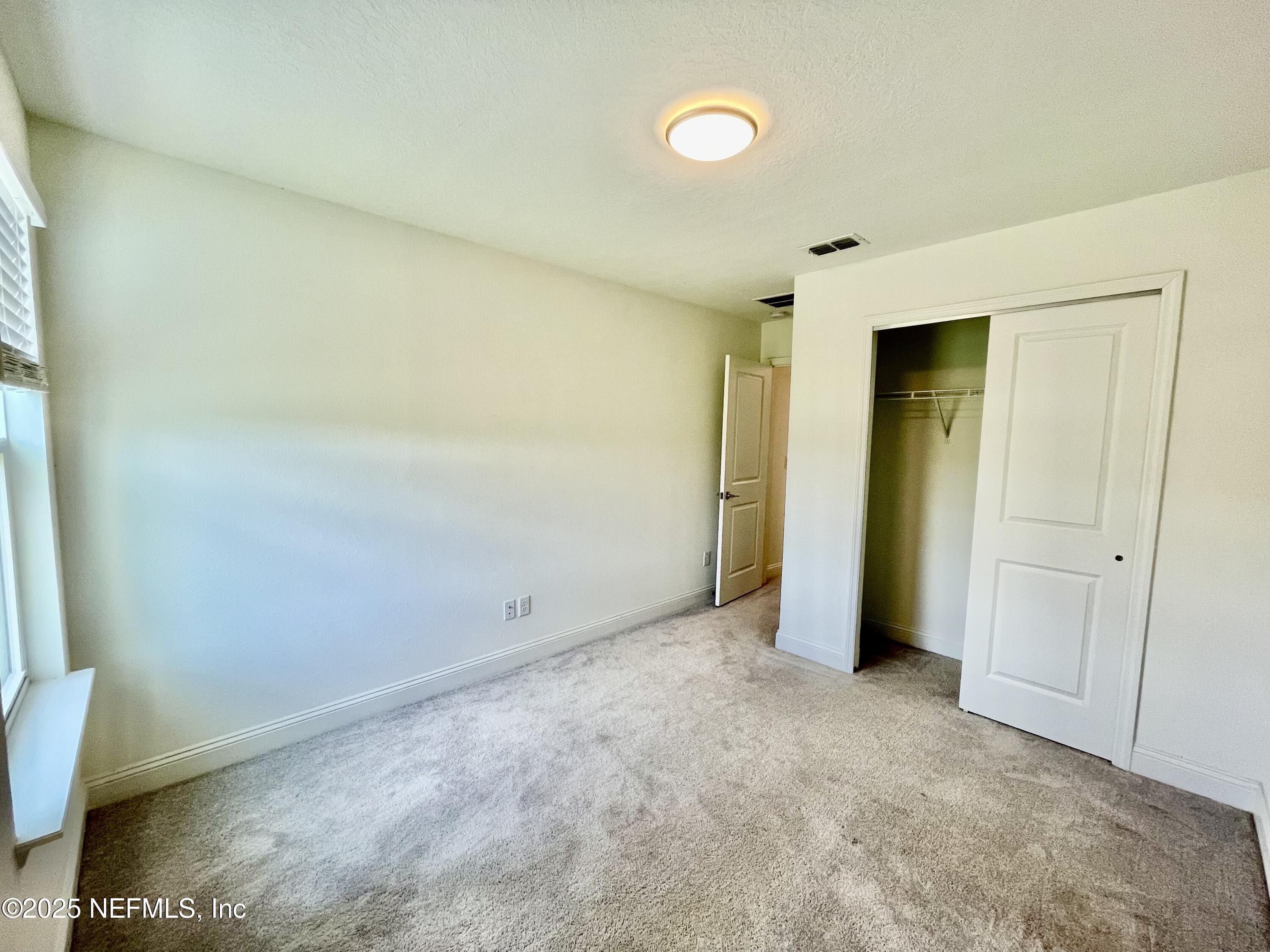 134 Varner Way St. Augustine, FL 32092 - Photo 21 of 30 an empty room with closet