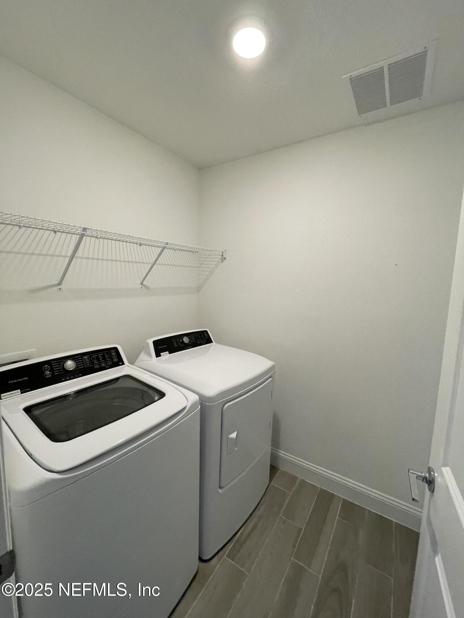 134 Varner Way St. Augustine, FL 32092 - Photo 24 of 30 a utility room with dryer and washer