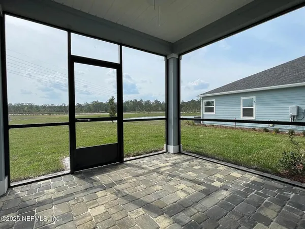 a view of porch with a backyard