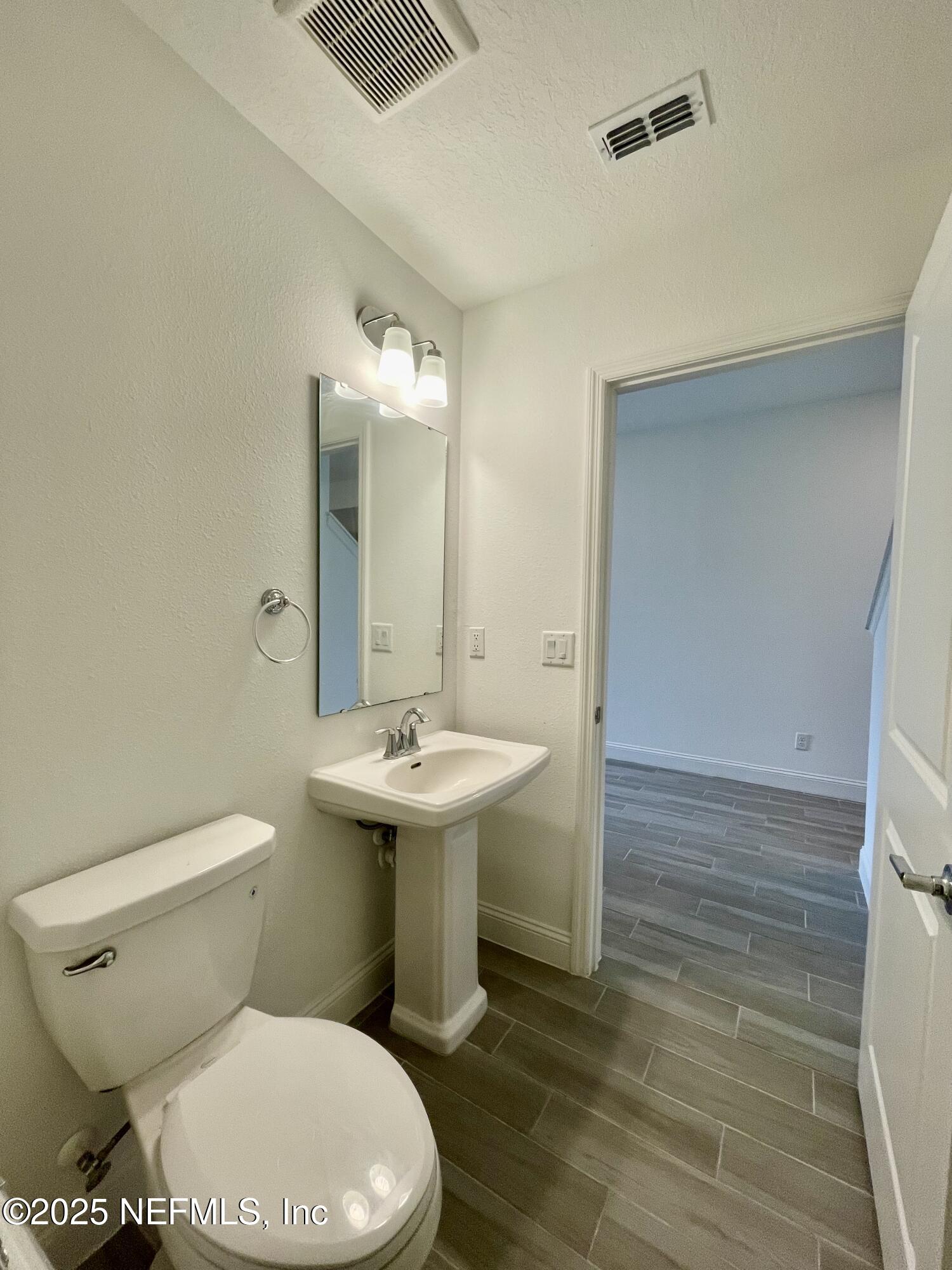 134 Varner Way St. Augustine, FL 32092 - Photo 10 of 30 a bathroom with a sink toilet and shower