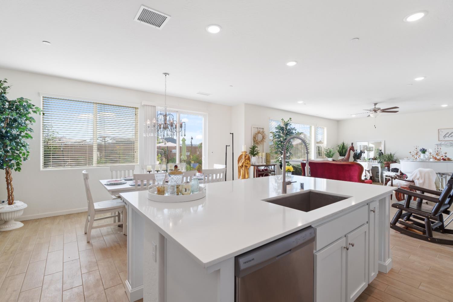1617 North Filbert Avenue Fresno, CA 93727 - Photo 12 of 45 a kitchen with sink and living room