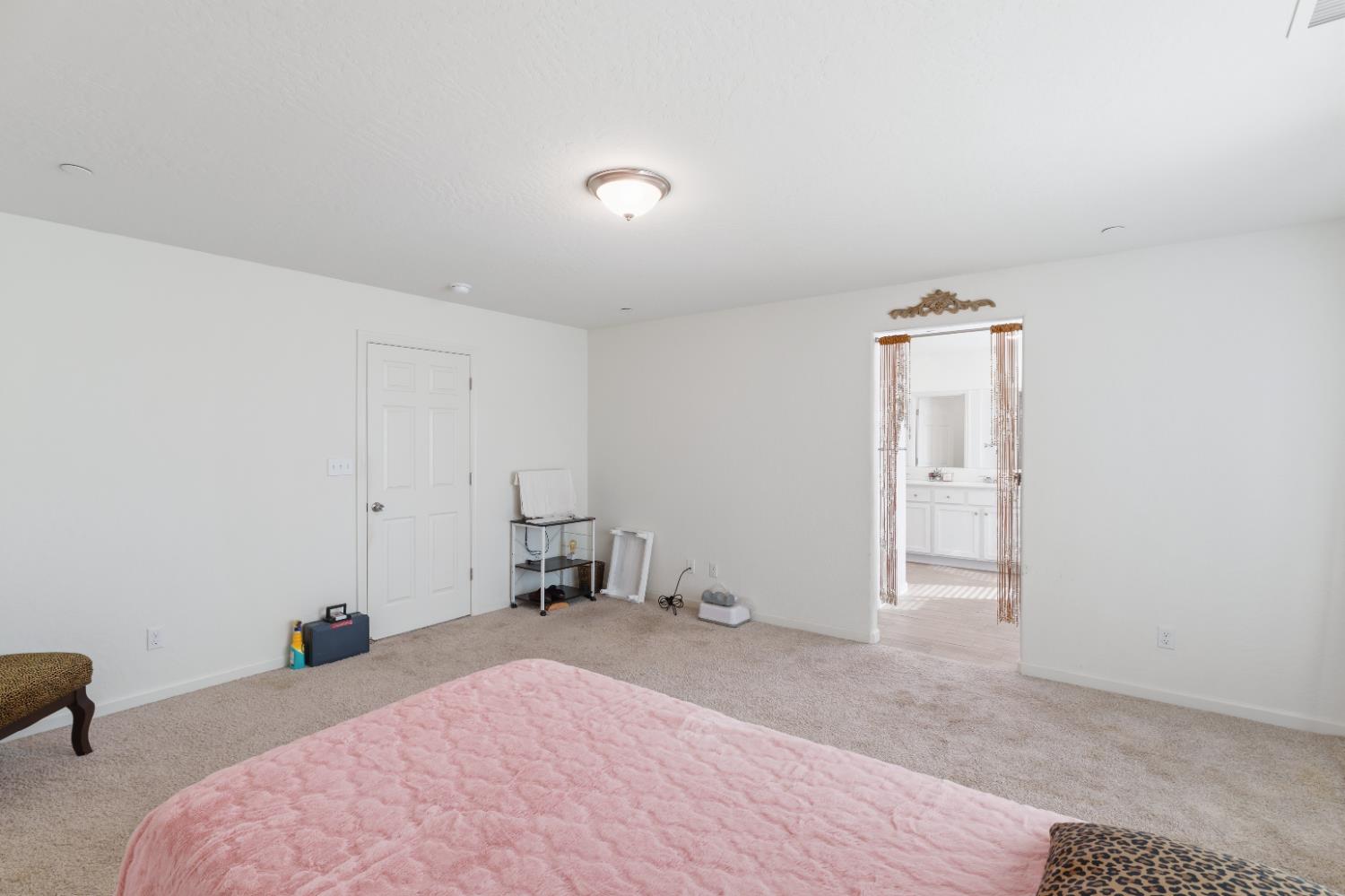 1617 North Filbert Avenue Fresno, CA 93727 - Photo 28 of 45 a bedroom with a bed and cabinets