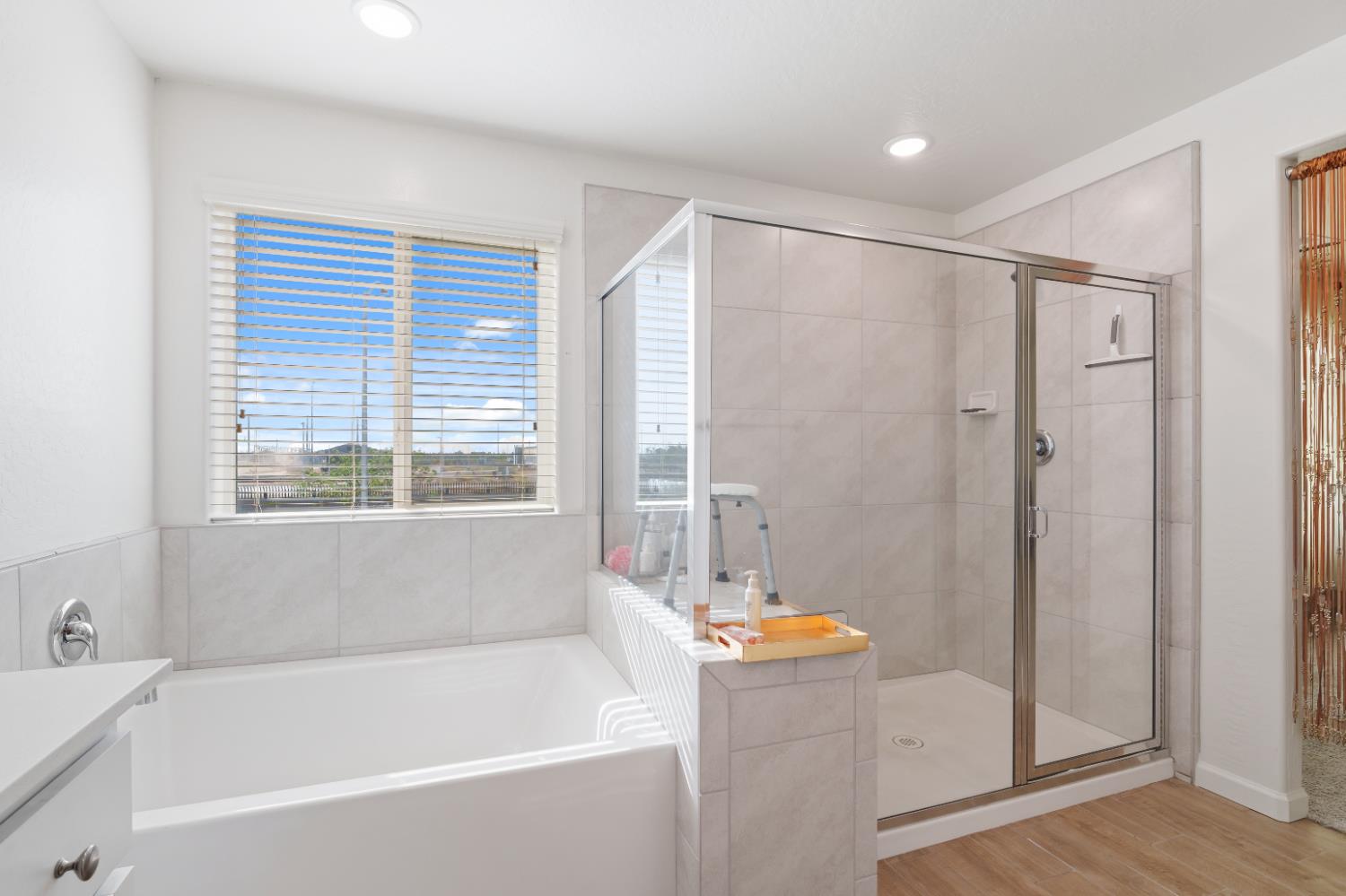 1617 North Filbert Avenue Fresno, CA 93727 - Photo 29 of 45 a bathroom with a bath tub and a shower