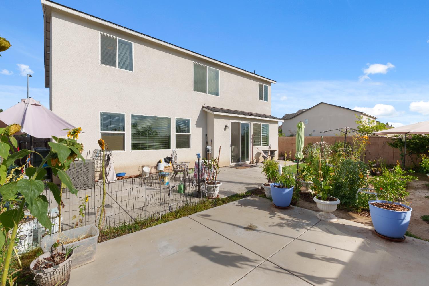 1617 North Filbert Avenue Fresno, CA 93727 - Photo 33 of 45 a view of a house with sitting area and garden
