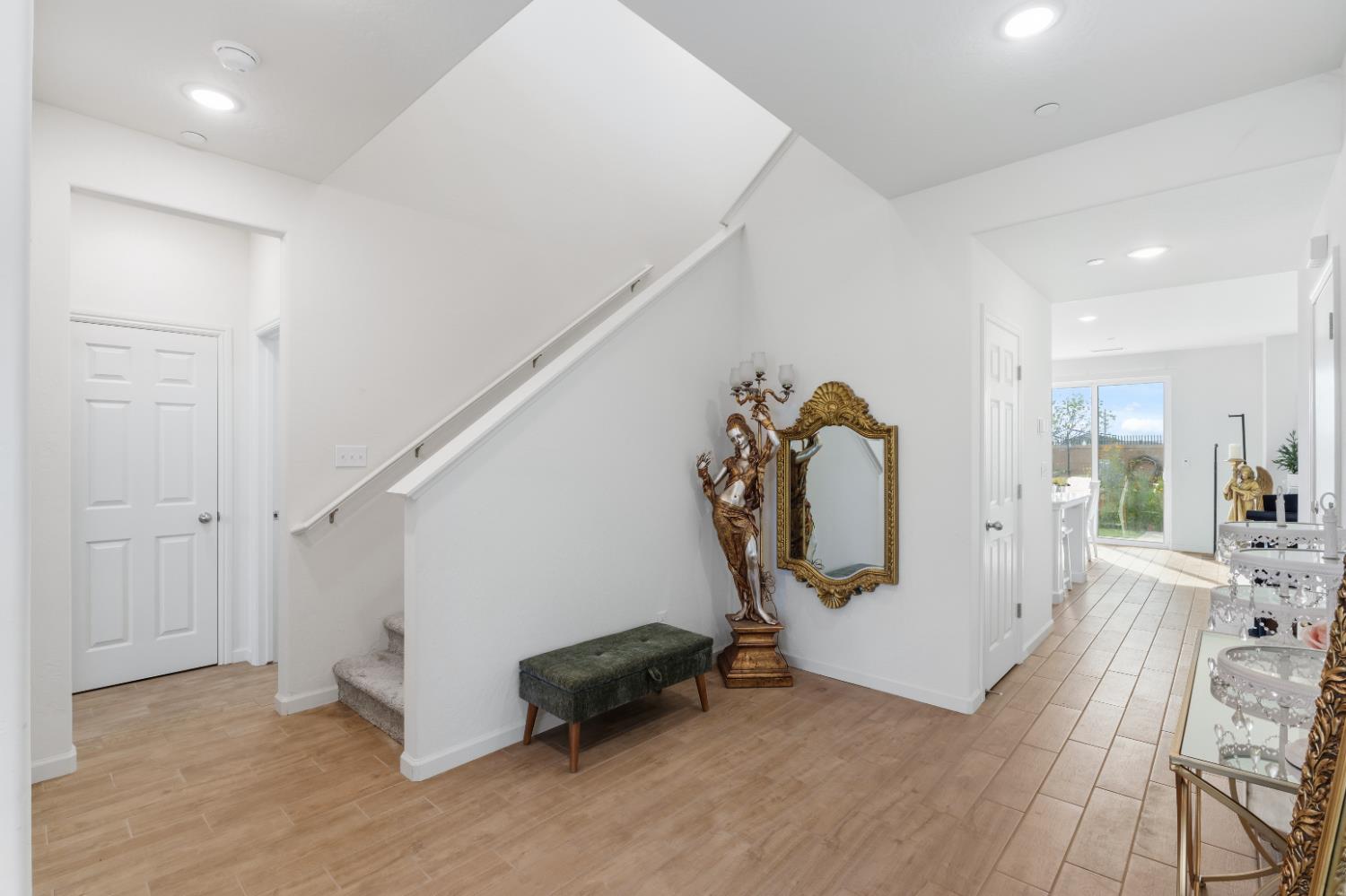 1617 North Filbert Avenue Fresno, CA 93727 - Photo 6 of 45 a view of a hallway with a livingroom and furniture