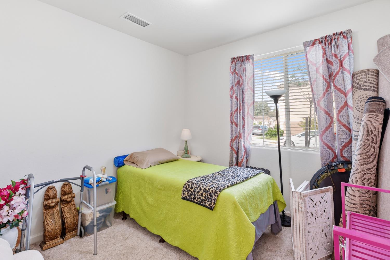 1617 North Filbert Avenue Fresno, CA 93727 - Photo 8 of 45 a bedroom with a bed and a painting on the wall