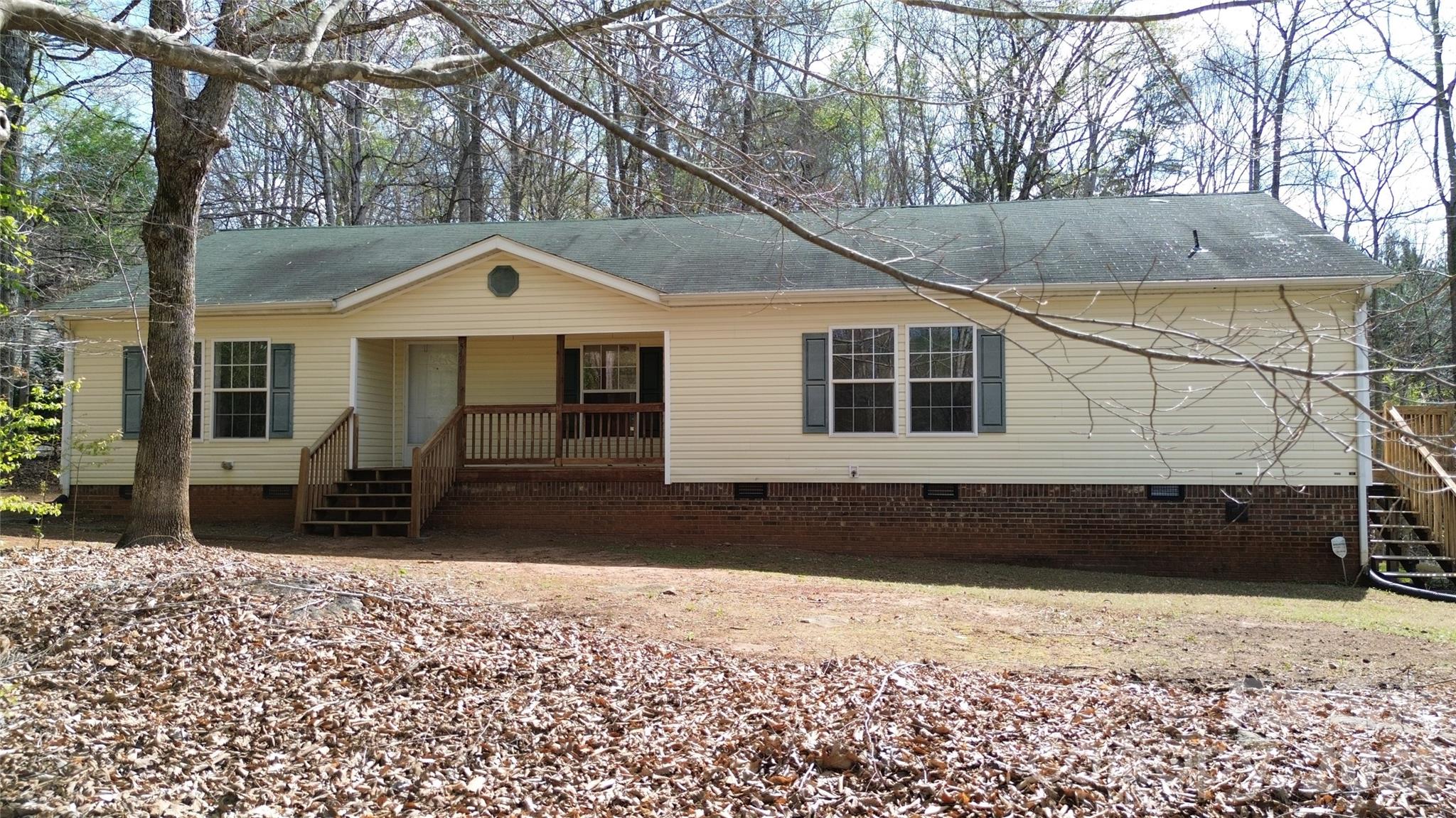 3441 Laboratory Road Lincolnton, NC 28092 - Photo 1 of 24 a front view of a house with a yard