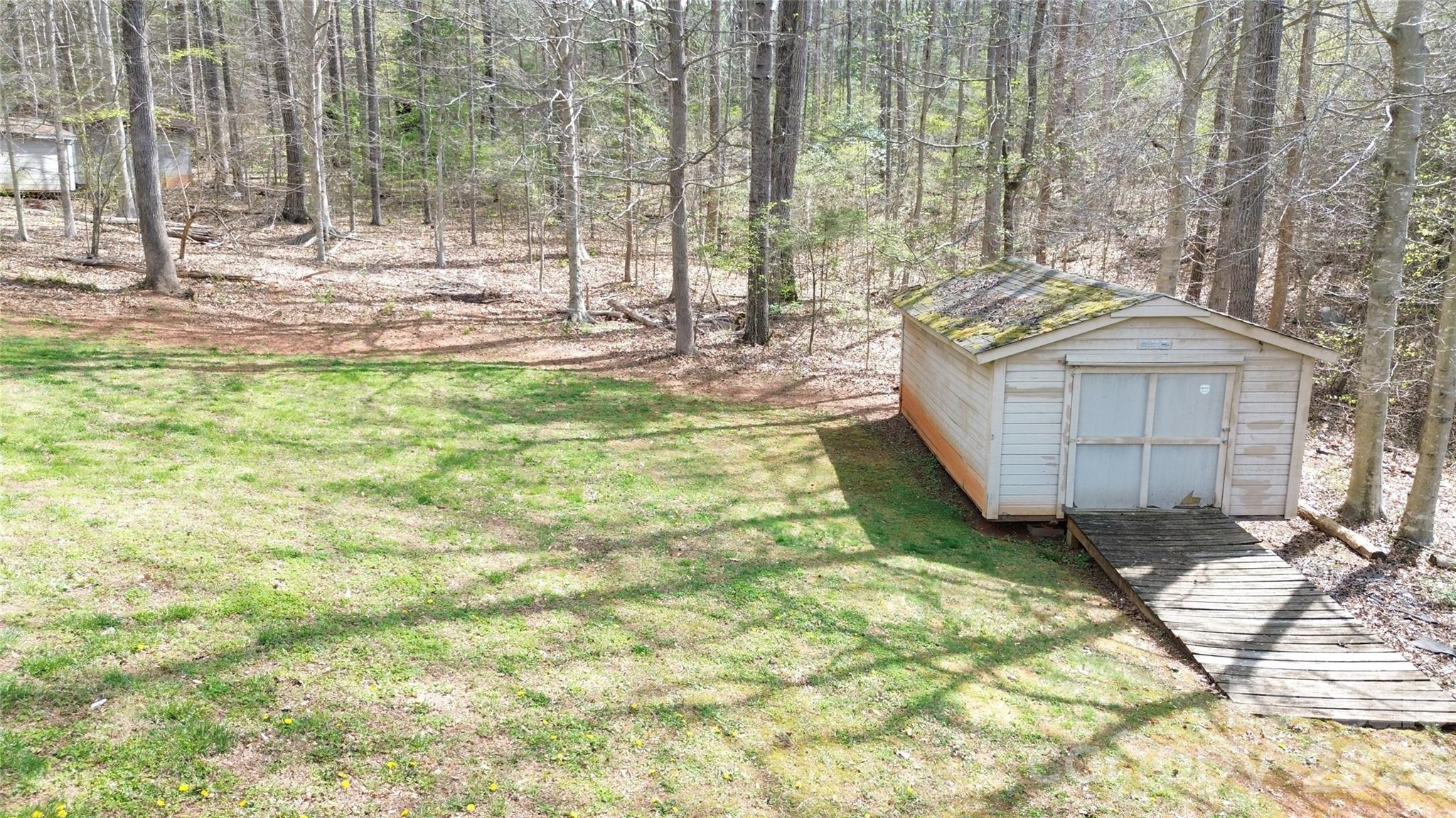3441 Laboratory Road Lincolnton, NC 28092 - Photo 21 of 24 a view of a yard with an outdoor space