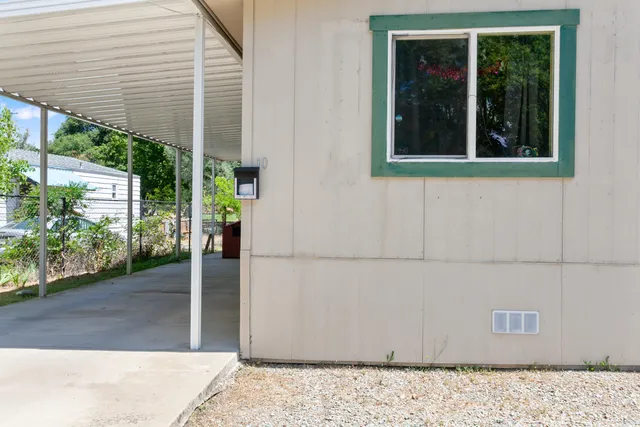 a view of entrance gate of a house