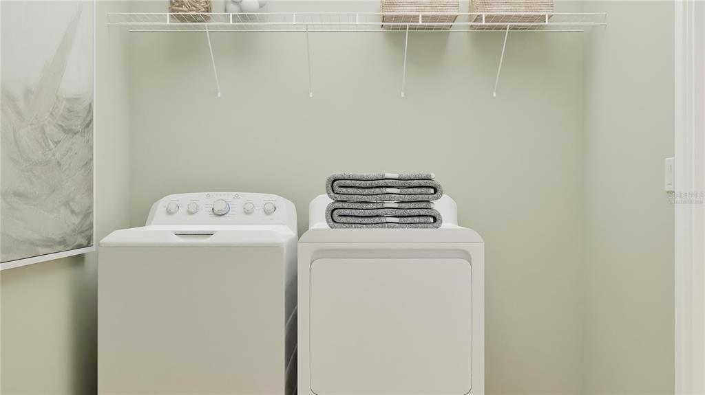 5198 Clay Whaley Road St. Cloud, FL 34772 - Photo 16 of 25 a utility room with dryer and washer