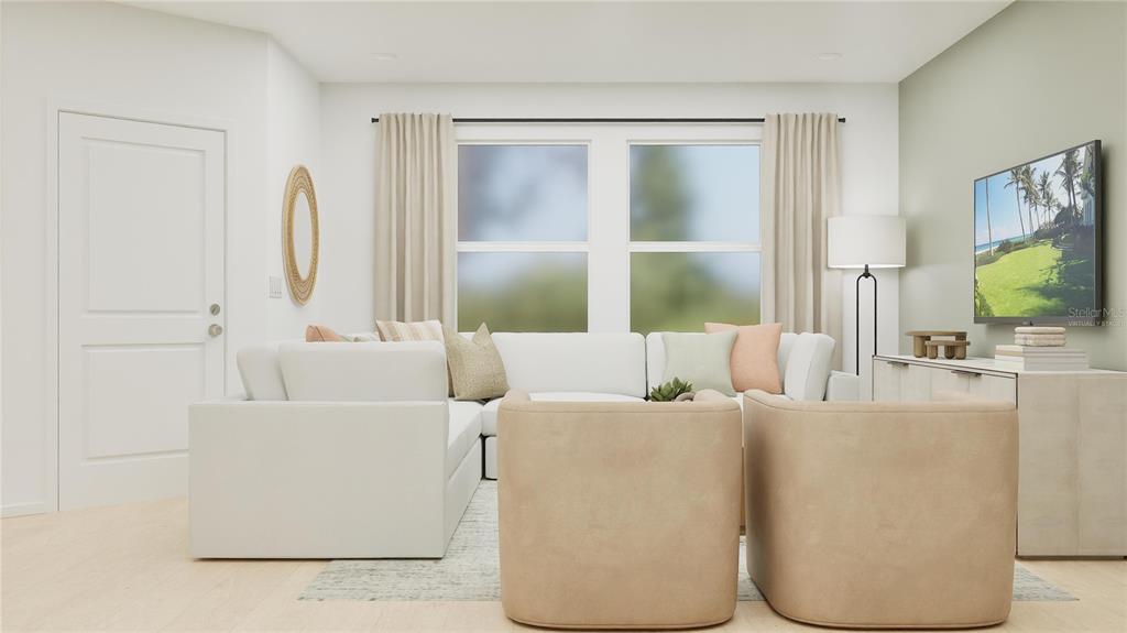 5198 Clay Whaley Road St. Cloud, FL 34772 - Photo 6 of 25 a living room with furniture and a large window